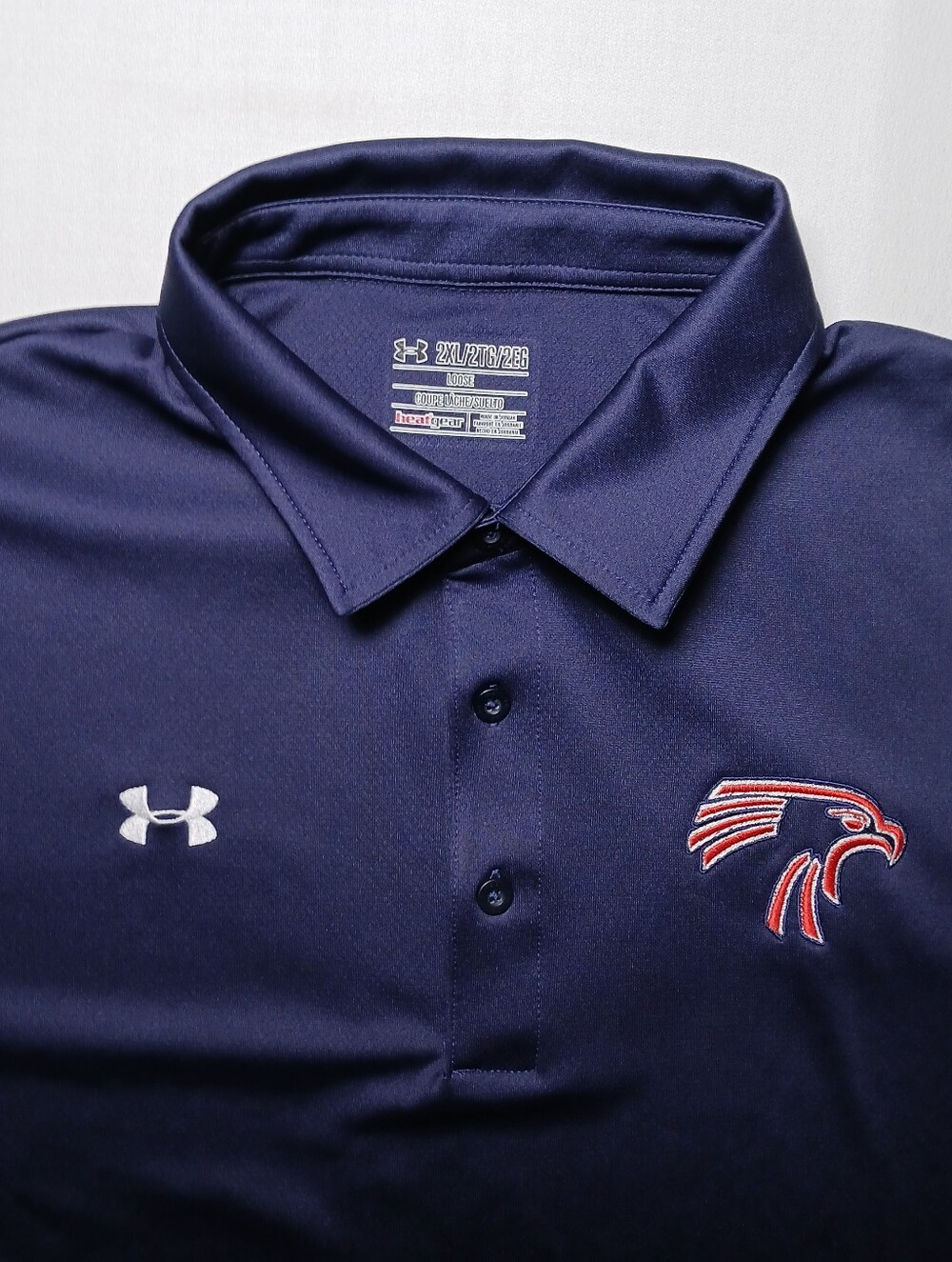 Under Armour Men’s Navy Polo with White Logo and Red Accent Hawk